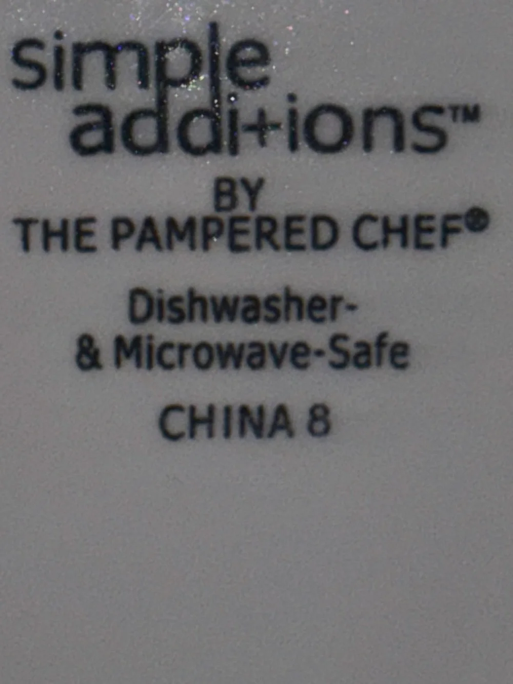 The Pampered Chef Square Ceramic Dish with Red and Multicolor Stripe Trim